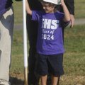 Jack Huddleston, 4, representing the Fayetteville High School class of 2024, prepares to help out Th...
