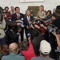 Media crowd for position during a conference held by Phil Ting, center left, the assessor-recorder f...