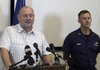 National Incident Commander Thad Allen, left, speaks at a news conference on Friday with U.S. Coast Guard Rear Admiral Paul Zukunft where Allen urged that crews must move forward with the drilling of the Deepwater Horizon relief well in the Gulf of Mexico in Schriever, Louisiana.