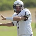 Huntsville quarterback Cody Stevens throws the ball during practice Thursday at the Eagles’ practice...