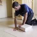 SPRUCING UP SPRING CREEK Cliff Bliss with Continental Flooring installs new tile Friday in one of th...