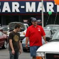 Guy Eaton (L) of Prairie Grove talks with detailer Chris Walton while shopping for cars Saturday, Au...