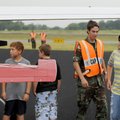 TAKING FLIGHT - Civil Air Patrol Cadet 2nd Lt. Dakota Swearengin, 17, helps Young Eagle fliers Noah ...