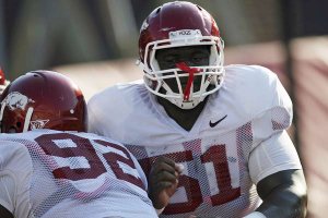Arkansas defensive tackle Alfred Davis (51) dedicated his off-season to getting into shape, a project that has caught the attention of the Razorbacks’ coaches and may earn him a starting spot.