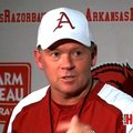 Arkansas Coach Bobby Petrino reacts to KAKS radio personality Renee Gork after answering a question ...