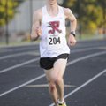 Bentonville’s Digger Lauter finishes first Monday in the Rogers Heritage Twilight Run in Rogers.