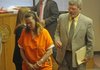 Delores Jean Eggert, 50, left, and her attorney Tim Buckley withdraw from the bench Monday after the Washington County woman pleaded guilty Monday to killing her mother. Eggert was sentenced to 30 years at the Arkansas Department of Correction after a plea bargain.