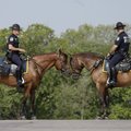 Mounted police guard an area near a shooting in McKinney, Texas, Tuesday, Aug. 17, 2010. 