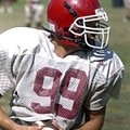 Farmington’s Jared Martin, who plays linebacker and running back for the Cardinals, turns upfield Mo...