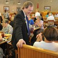 David Whitaker, a candidate for the 3rd District congressional seat, visits Tuesday at a senior Demo...