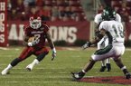 Arkansas running back Knile Davis (7), who rushed for 163 yards and four touchdowns in 2009, worked some at fullback in spring practices and has taken about 20 percent of his snaps in practice this month at fullback.