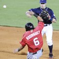 Northwest Arkansas shortstop Chris McConnell throws to first base for a double play as Frisco’s Guil...