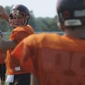 Gravette quarterback Colton Davis throws during practice Friday.