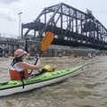 Wynne Odell of Fort Collins, Colo., exits a lock on the Mississippi River at the Quad Cities during ...