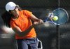  Rogers Heritage No. 1 girls player Pratheepa Ravikumar returns the ball in her singles match Thursday against Van Buren in Rogers.
