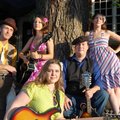 CANDY LEE — The folk and jazz sounds of Candy Lee and her backing band, The Sweets, can be found sta...