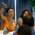 Janine Parry, a University of Arkansas political science associate professor, speaks during the pane...