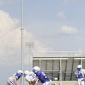  Rogers High linemen work on blocking technique during a recent practice. The Mounties are battling ...