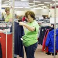 Dorothy Tackett of Gateway looks at a shirt while shopping at the Samaritan Shop of Rogers on Thursd...