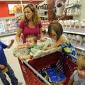 Melanie Simpson of Bella Vista shops for groceries with her children Jack, 8, left, Ryan, 1, Ella-Ka...