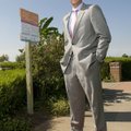 Matt Hicks stands at one of the Born Learning Trail stations at the Jones Center in Springdale on Mo...