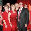 Color of Hope chairmen Lori and Steve Collins, center, are surrounded by family members Jack and Kar...