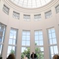 Springdale High School principal Peter Joenks speaks under the dome during an open house Sunday in t...