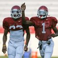 Arkansas’ Maudrecus Humphrey, left, and Marquel Wade battle for position in a drill during practice ...