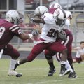 Springdale High’s Rahmon Taylor breaks past Siloam Springs defenders Tuesday in a scrimmage at Siloa...