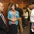 Robert Greenwood, left, of Greenwood Gearhart Inc., Susan Slinkard of BancorpSouth, and Ron Johnson ...