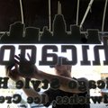 Trent Hamilton with Sign Artists applies the final touches to a newly installed vinyl sign Wednesday...