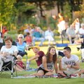 GARDEN GRAZE - Erin Robertson, center, and boyfriend Andrew Van Genderen, both University of Arkansa...