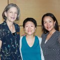 Symphony advisory board member Mary Benjamin, from left, and symphony violinists Er-Gene Kahng and M...