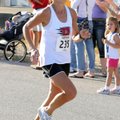 Marilyn Caulfield enters the home stretch to win the women’s division of the Eliminator 5K.