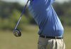 Rogers High senior Grant Washburn watches his tee shot on No. 8 during the Mounties’ match with Har-Ber Thursday at Stonebridge Meadows Golf Club in Fayetteville.
