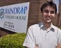 Mehmet Ulupinar stands outside the Raindrop Turkish House in west Little Rock.