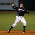 Northwest Arkansas shortstop Chris McConnell throws toward first base Tuesday during the Naturals’ g...