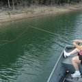 Sallyann Brown lays out a cast with her fly rod while fishing along the west shoreline of Rocky Bran...