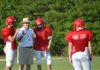  Harmony Grove head football coach Red Parker works on the punt return with players.