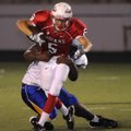 Fayetteville Ramay’s Aaron Kildow tries to get away from a Springdale Central defender on Thursday i...