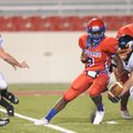 Rogers High’s Bronson Carpenter carries the ball in the first quarter on Sept. 18 against Van Buren ...