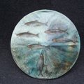 Local artists turned used bicycle wheels into works of art to be auctioned off at the Omni Center to...