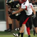 Magazine’s Cory Chambers tackles West Fork’s Nathan Miller after Miller caught a pass Friday at West...