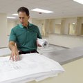 Loy Bailey, district manager with the Arkansas Department of Health, gives a brief tour Wednesday of...