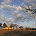 The first light of morning hits the old Judge Cummins house at the Southpass development on Dec. 12,...