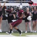 Springdale High’s Henry Hernandez scores the first touchdown against Little Rock Catholic in the fir...