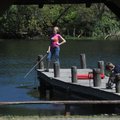 Jurnie Hensley, 12, left, and her brother, Johnathon Hensley, 13, both of Wesley, fish on Sunday fro...