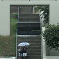 Pedestrians walk down stairs Tuesday leading away from the Arkansas Union on the University of Arkan...