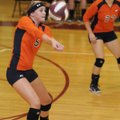 Rogers Heritage’s Shelby White returns the ball against Springdale High on Tuesday in Springdale.
