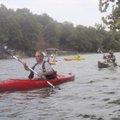 Jack Stewart leads a flotilla of kayaks at Lake Windsor on the Bella Vista kayakers’ weekly paddling...